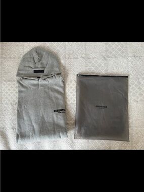 New Essentials Men’s Light Gray Pullover Hoodie with Small Logo